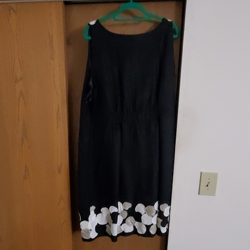 Black dress with tan and white accents.